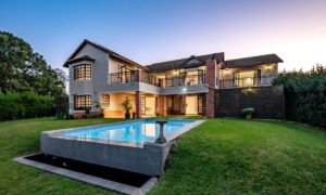 Green living - R5.75m Hillcrest: Priced at R5.75 million through Pam Golding Properties, this modern, double-storey ‘smart’ home in Clifton Hill Estate in Hillcrest, in KwaZulu-Natal’s Upper Highway area, has 94% off-the-grid functionality, meticulously designed with water and energy-saving features such as Jojo tanks equipped with a filtration system, and strategically positioned solar panels on the home, garden shed and greenhouse. It includes a brand-new state-of-the-art gourmet kitchen, spacious office - easily convertible into a guest suite with a separate entrance, cinema lounge, open-plan lounge and dining room, complemented by a gas fireplace, extending to the exterior undercover patio area. Overlooking the salt-chlorinated infinity pool with a heat pump, this space is perfect for entertaining in all weather conditions. Spacious bedrooms, a pyjama lounge, landscaped garden, and double automated garages leading directly into the home, are just a few features. Clifton Hill Estate takes pride in its recycling program, embraced by all residents, who also enjoy access to the Legends Lifestyle Centre and Legends Cafe, equipped with a gym, tennis courts/pickleball courts, communal swimming pools, squash courts, a leisure centre, and two parks for children. The estate has 24-hour manned security and innovative facial recognition access, all conveniently included in the levies.