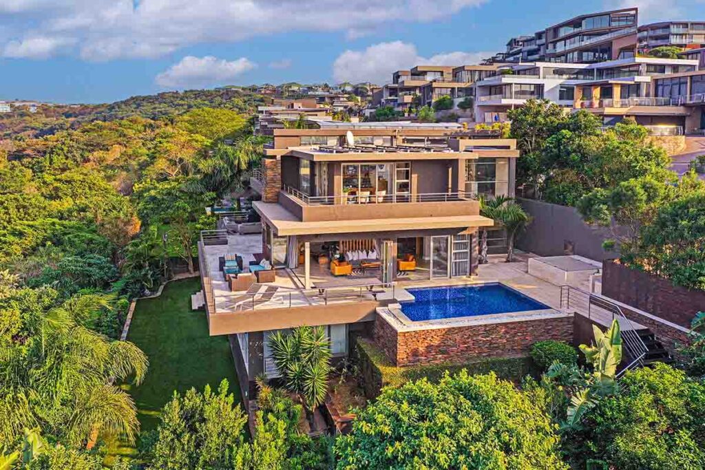 La Lucia home for sale R18m: Marketed at R18 million through Pam Golding Properties, this luxury, six-bedroom mansion is situated in prime, front-row position in one of KZN’s most sought after security estates, with uninterrupted sea, forest and city views.