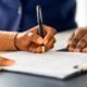 Applicant completing a Z83 job application form for Department of Public Works and Infrastructure vacancies