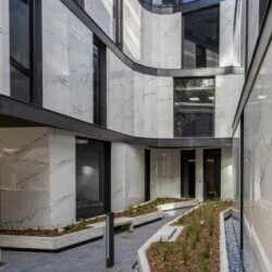 The undulating geometry of the build creates private courtyards in unexpected areas.